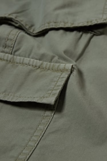 Ragazzi e giovani - CLOCKHOUSE - pantaloni cargo - vita media - relaxed fit - verde