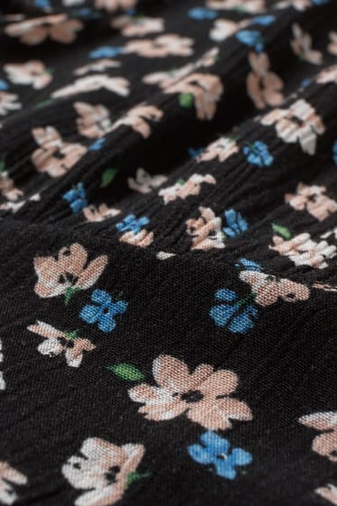 Dospívající a mladí - CLOCKHOUSE - empírové šaty - s květinovým vzorem - černá