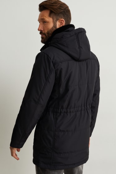 Hombre - Parka con capucha y adorno de pelo sintético - negro