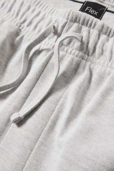 Pánské - Teplákové šortky - Flex - světle šedá-žíhaná