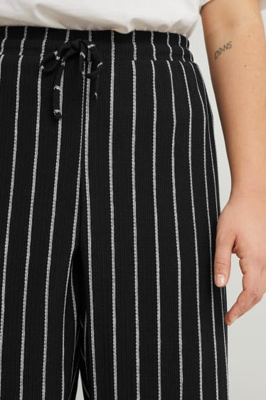 Femei - Pantaloni de stofă - talie înaltă - wide leg - cu dungi - negru