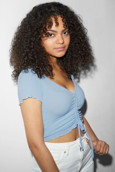 Dona - CLOCKHOUSE - samarreta crop - blau clar