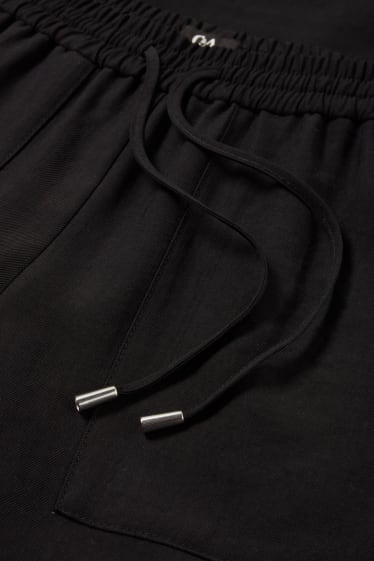 Dona - Pantalons de tela - high waist - relaxed fit - negre