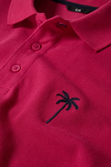 Hombre - Polo - fucsia