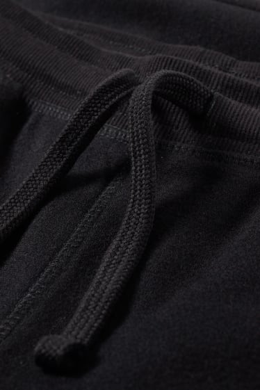 Kinder Buben - Jogginghose - genderneutral - schwarz