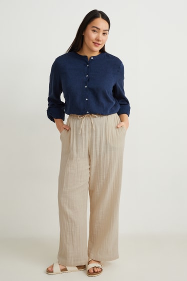 Women - Cloth trousers - mid-rise waist - light beige