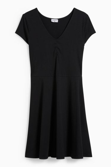 Dona - CLOCKHOUSE - vestit acampanat - negre