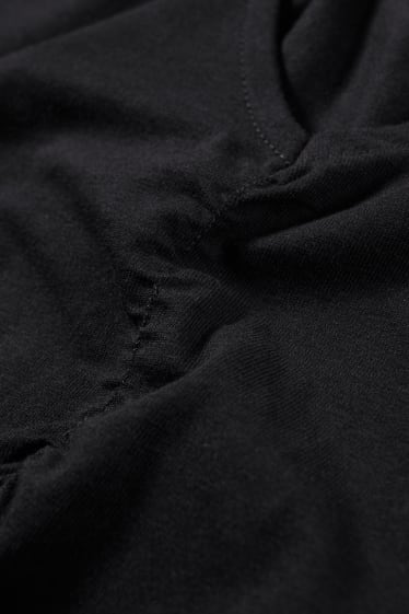 Dona - CLOCKHOUSE - vestit acampanat - negre