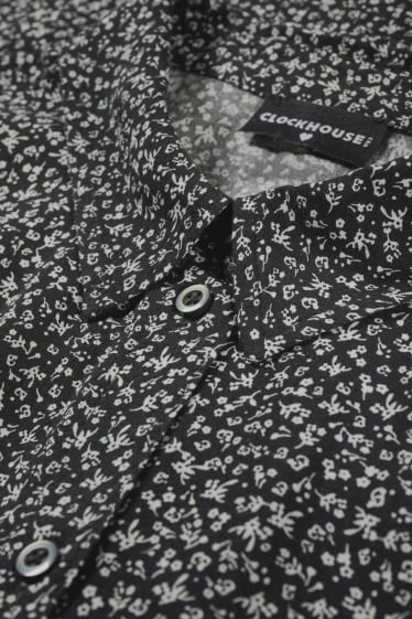 Jóvenes - CLOCKHOUSE - top ablusado - de flores - negro