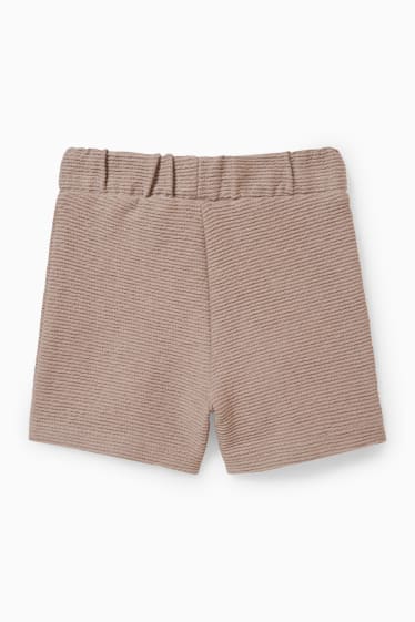 Nadó nen - Pantalons curts per a nadó - marró clar