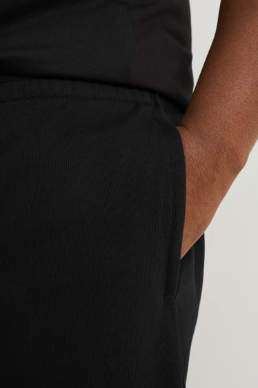 Uomo - Shorts di felpa - nero