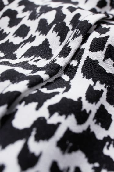 Femmes - Robe croisée - noir / blanc