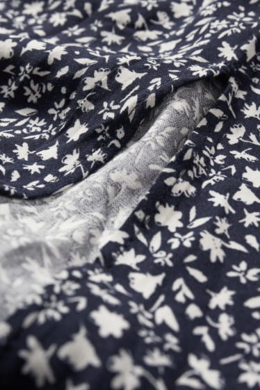 Dona - Faldilla - de flors - blau fosc / blanc trencat