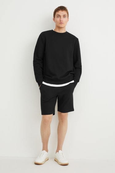 Uomo - Shorts di felpa - nero