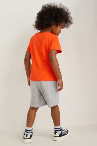 Bambini - Dinosauri - set - t-shirt e shorts - 2 pezzi - arancio scuro