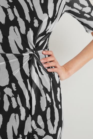 Damen - Figurbetontes Kleid mit Knotendetail - gemustert - schwarz / grau