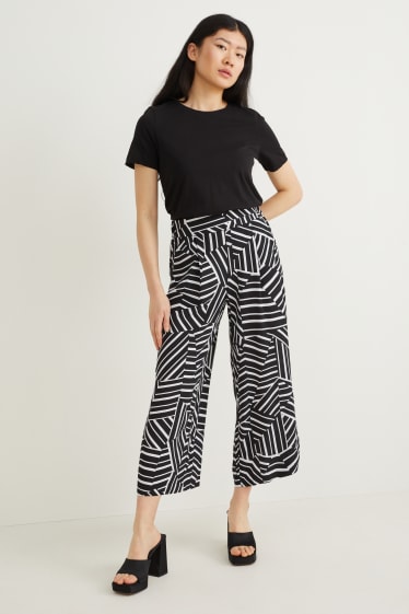 Dames - Pantalon - high waist - palazzo - met patroon - zwart / wit