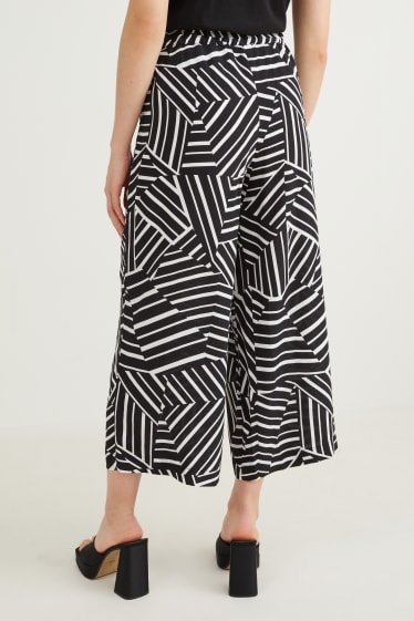 Kobiety - Spodnie materiałowe - wysoki stan - palazzo - ze wzorem - czarny / biały