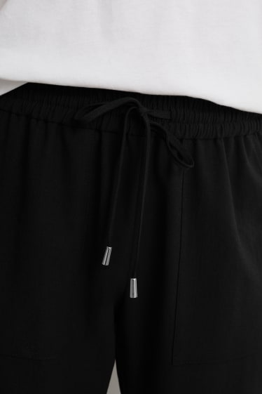 Dona - Pantalons de tela - high waist - relaxed fit - negre