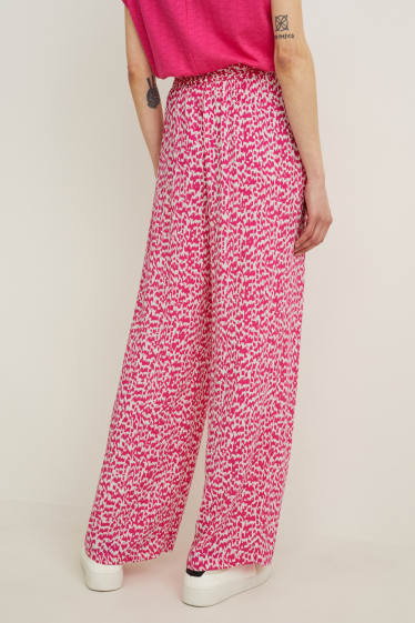 Dámské - Plátěné kalhoty - mid waist - palazzo - se vzorem - růžová