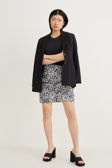 Women - Mini skirt - patterned - black / white