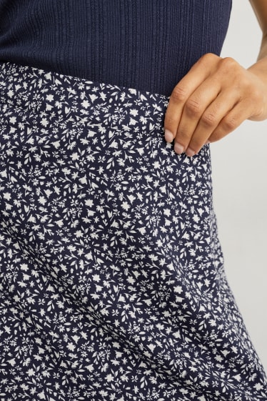 Dona - Faldilla - de flors - blau fosc / blanc trencat