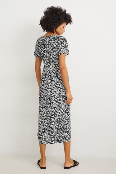 Femmes - Robe croisée - noir / blanc