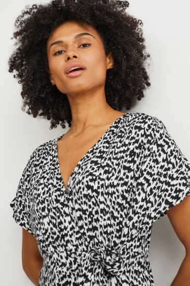 Femmes - Robe croisée - noir / blanc
