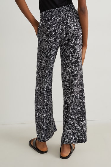 Women - Cloth trousers - mid-rise waist - palazzo - patterned - black