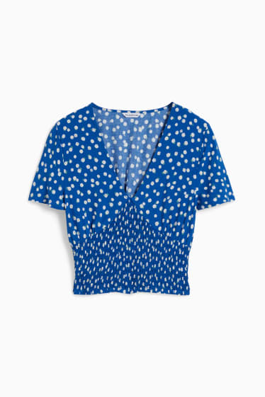 Dona - CLOCKHOUSE - brusa crop - de flors - blau fosc
