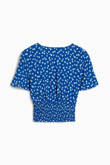 Dona - CLOCKHOUSE - brusa crop - de flors - blau fosc
