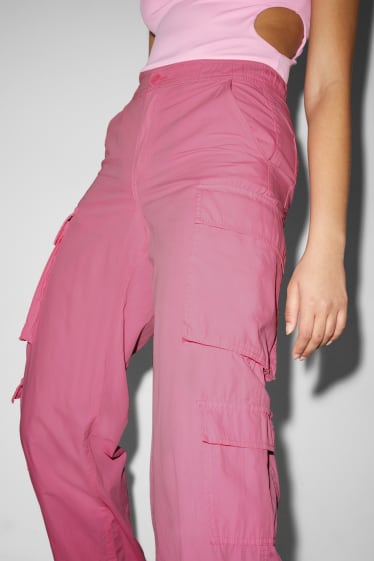 Dospívající a mladí - CLOCKHOUSE - cargo kalhoty - mid waist - relaxed fit - růžová