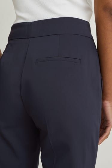 Mujer - Pantalón de tela - mid waist - flared - azul oscuro