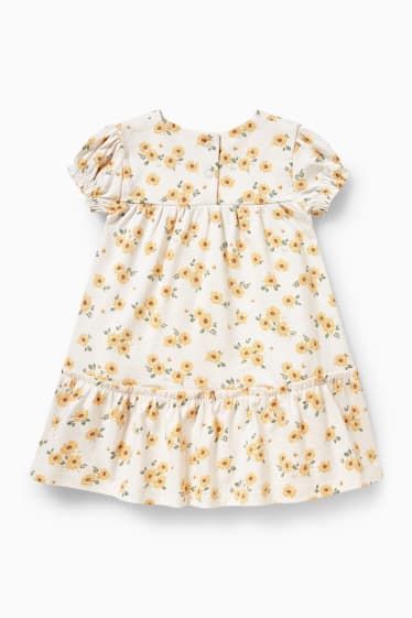 Niemowlęta - Sukienka niemowlęca - w kwiaty - kremowobiały