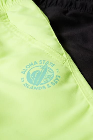 Kinderen: jongens - Set van 2 - shorts - neon geel