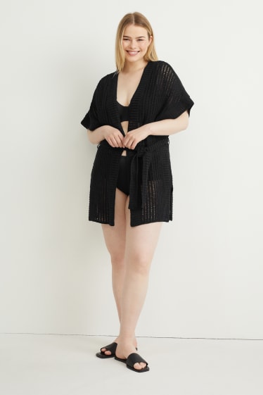 Women - Knitted poncho - black