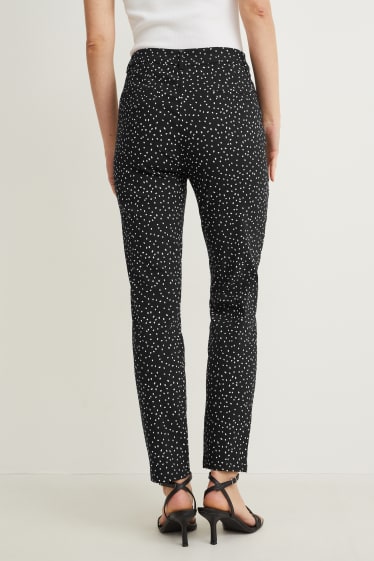 Femmes - Pantalon - mid waist - slim fit - Flex - à pois - noir