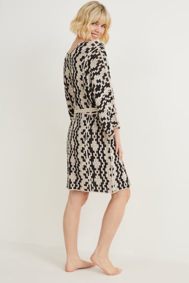 Femmes - Poncho en maille - beige clair