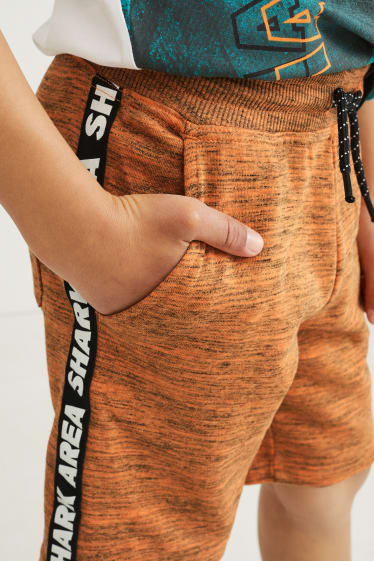 Kinderen: jongens - Bermuda van sweatstof - oranje