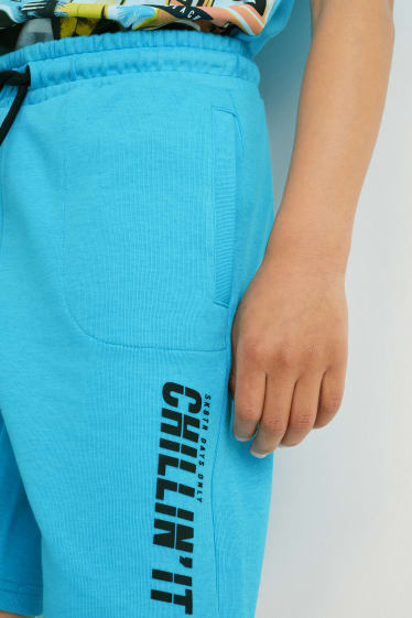 Kinderen: jongens - Bermuda van sweatstof - turquoise