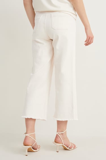 Kobiety - Wide leg jeans - wysoki stan - beżowy