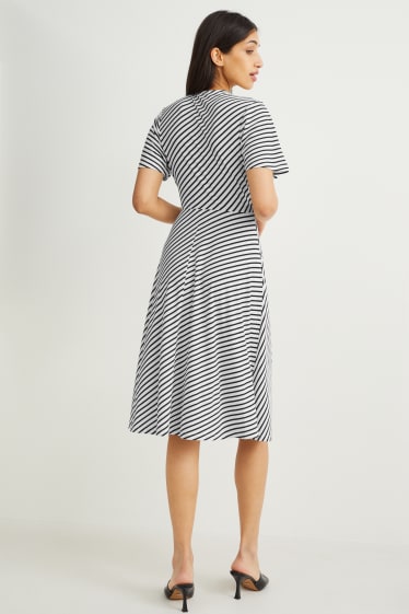 Women - Wrap dress - striped - black / white
