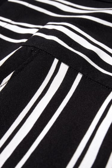 Femmes - Pantalon de toile - mid waist - palazzo - à rayures - noir / blanc