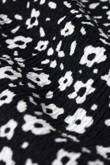 Women - CLOCKHOUSE - jumpsuit - floral - black / white