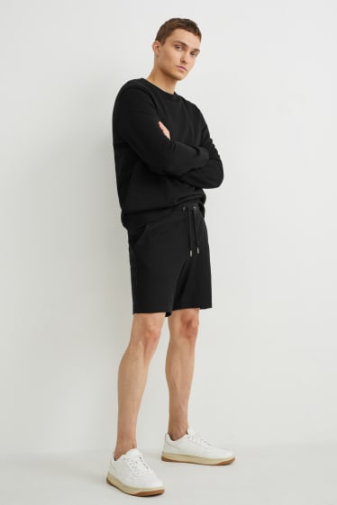 Uomo - Shorts - nero