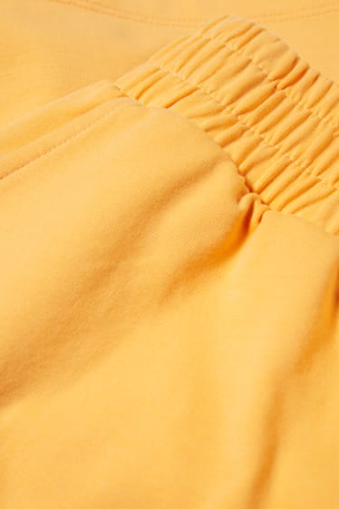 Dona - CLOCKHOUSE - pantalons curts de xandall - taronja