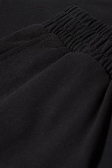 Dona - CLOCKHOUSE - pantalons curts de xandall - negre