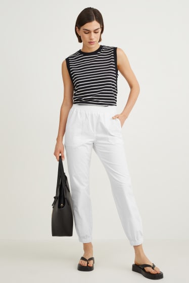 Women - Cloth trousers - mid-rise waist - tapered fit - white