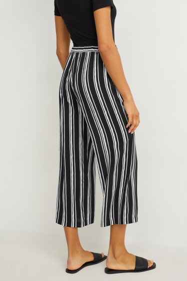 Femmes - Pantalon de toile - mid waist - palazzo - à rayures - noir / blanc