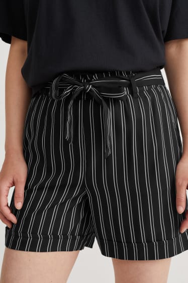 Dona - Pantalons curts - cintura mitjana - de ratlles - negre